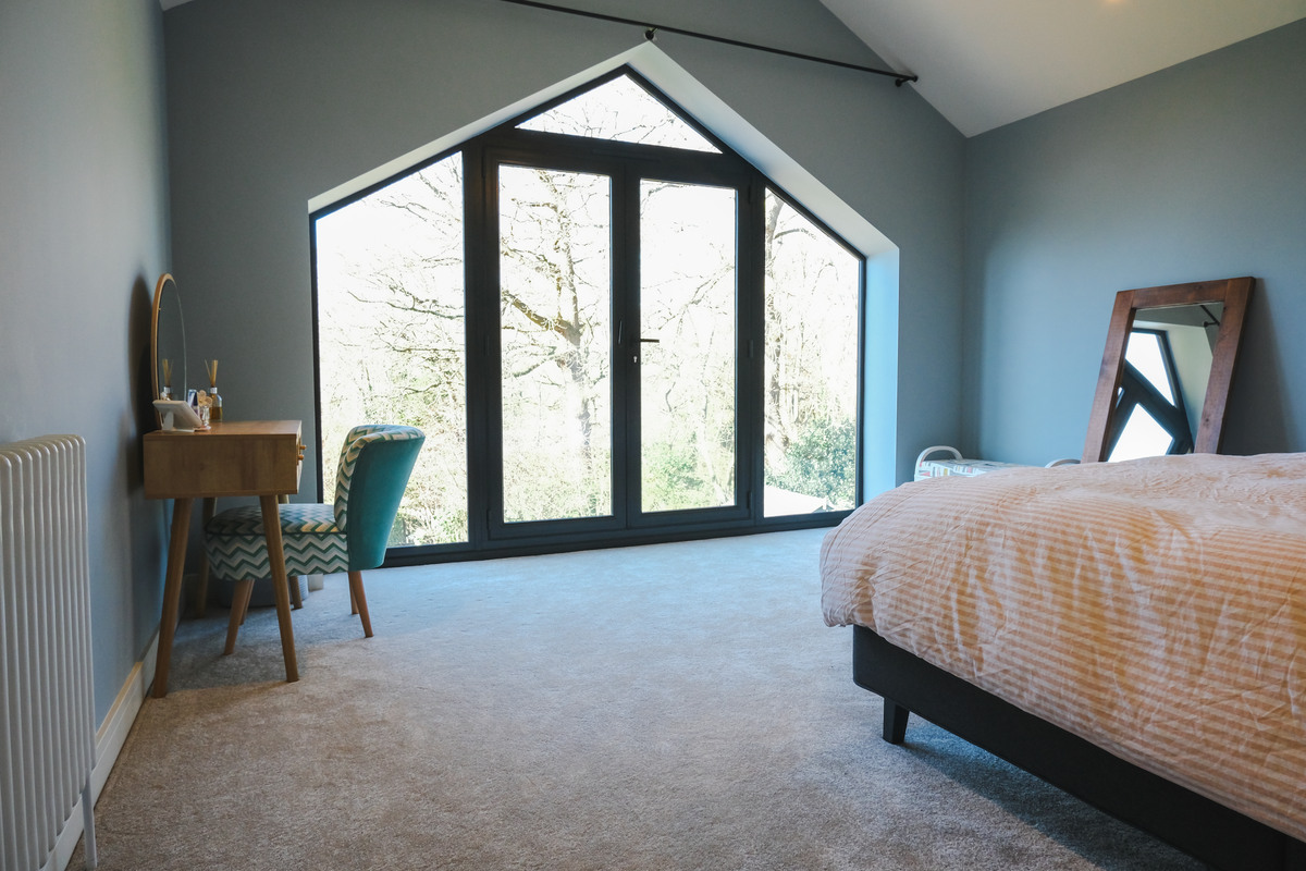 Bedroom interior in the Bell Barn Road renovation, Bristol
