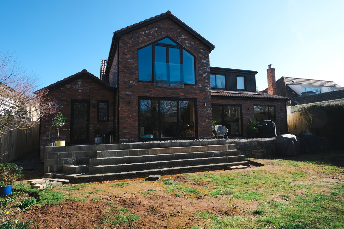 Rear view showing patio and landscaping at Bell Barn Road, Bristol
