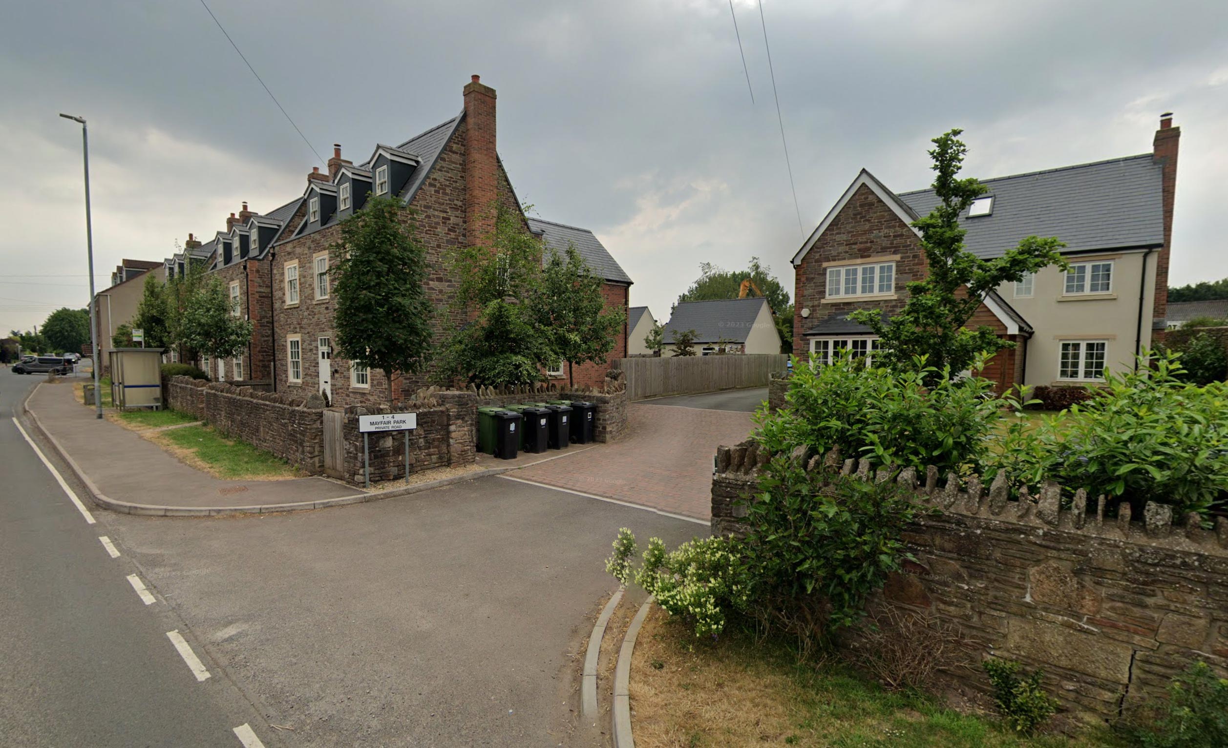 Front view of four luxury detached houses built and project managed at Mayfair Park, Bristol.