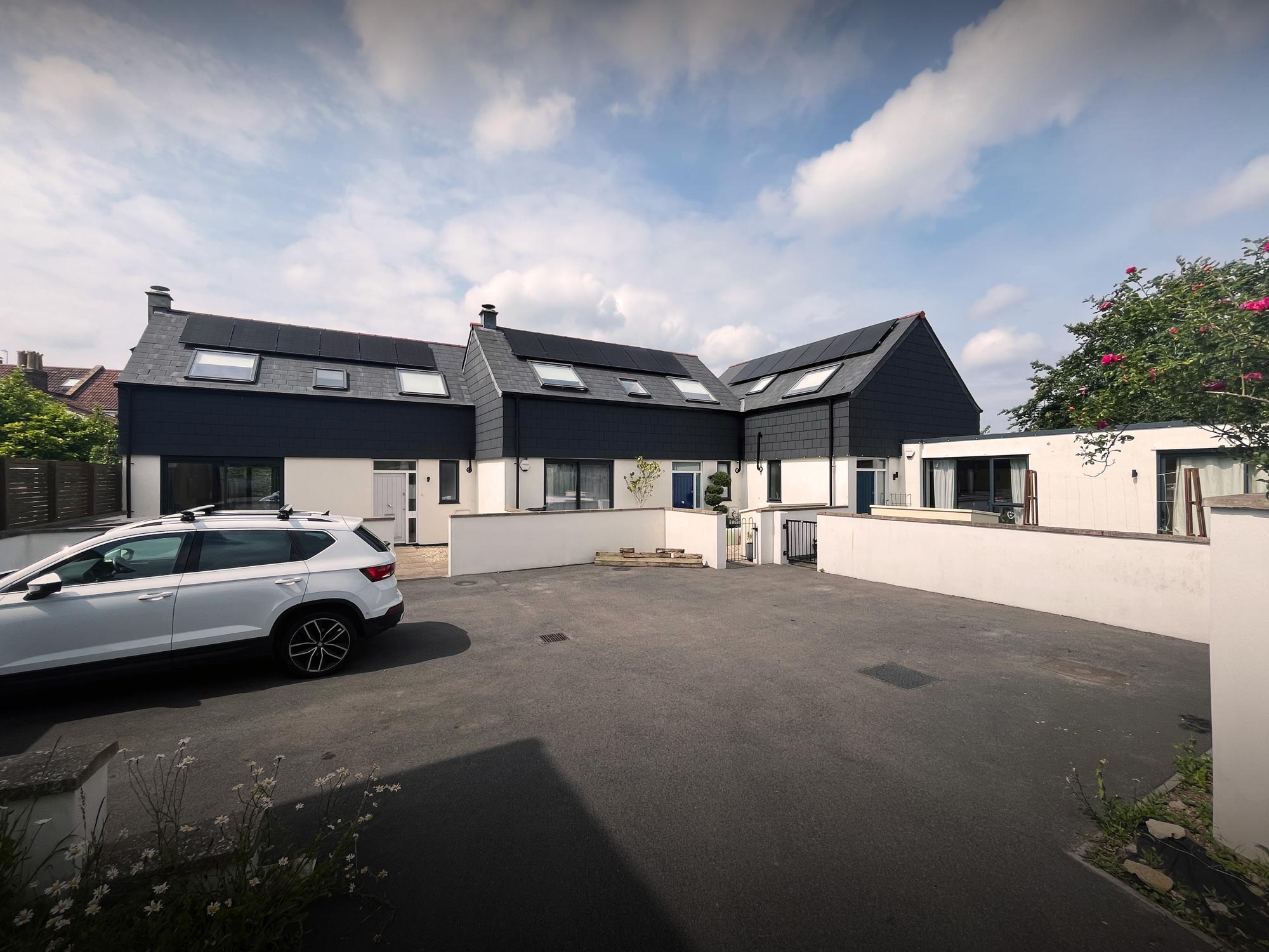 Exterior view of three mews cottages at Seymour Mews, Bishopston, Bristol, project managed by Foley Allan